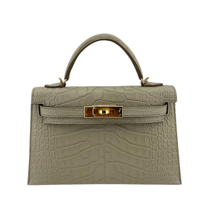 Hermès Kelly 20 Sellier Mate Missi Aligátor Beton Herrajes Dorados