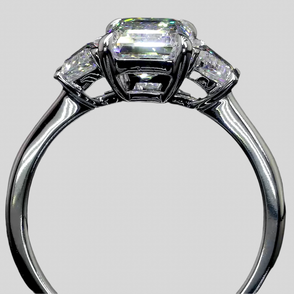 6.88 Carat Emerald Diamond Three-Stone Ring